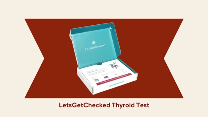 The LetsGetChecked at home thyroid test kit against a red and beige background